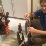 Eric helps with bottling